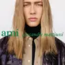 AMI Paris Fall Winter 2026 campaign photographed by Karim Sadli featuring layered outerwear and contemporary Parisian styling