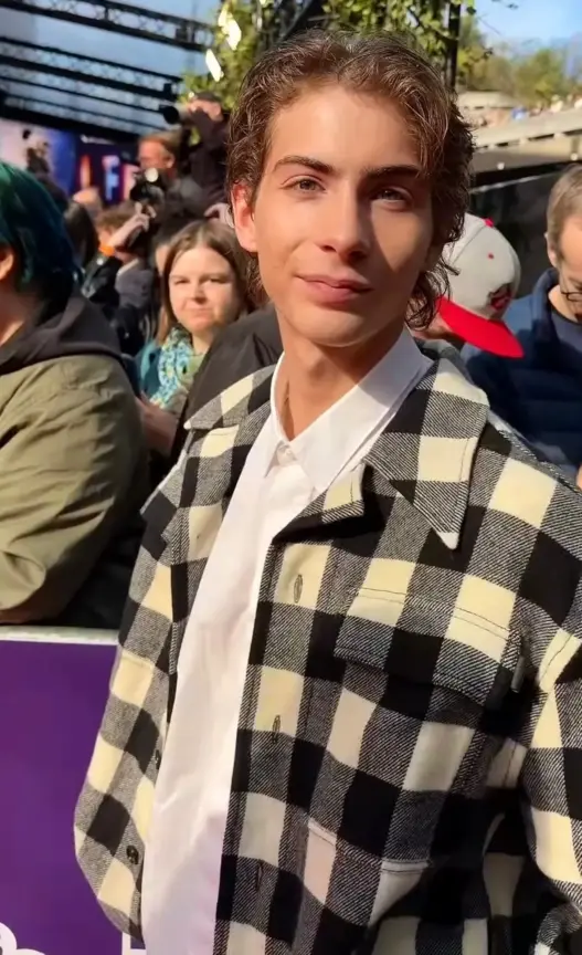 Jacob Tremblay wearing a black-and-white checked ensemble at the Wildwood premiere during the 2026 BFI London Film Festival