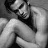 Black-and-white intimate portrait of model Matija Bogićević photographed by Miloš Nadaždin for In the Shadows