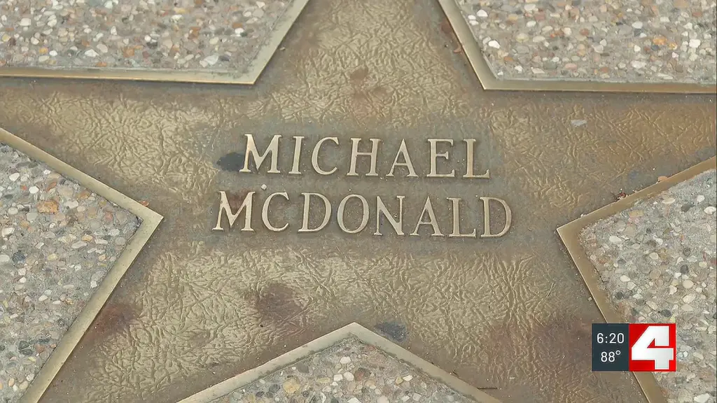 Frame from First Alert 4's story on Michael Goessling's reunion with the family of Michael McDonald