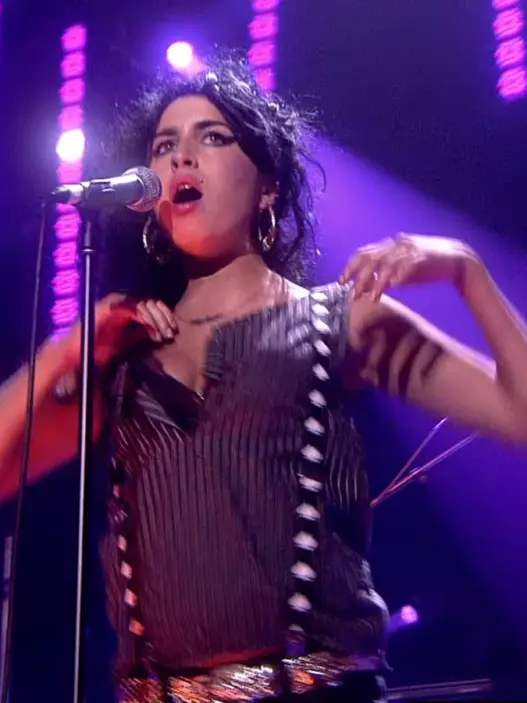 Amy Winehouse performing Back to Black live during The Album Chart Show in November 2006