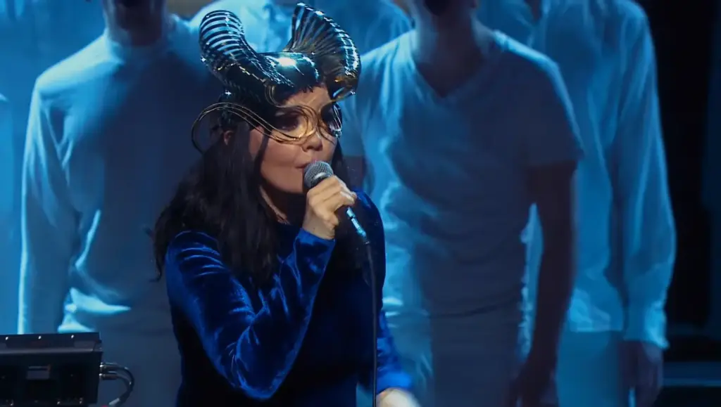 Björk performing “Where Is the Line” with the Hamrahlíð Choir at Harpa Hall in Reykjavík, Iceland.