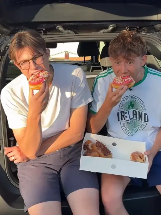 Max and Armand trying American donuts in Los Angeles