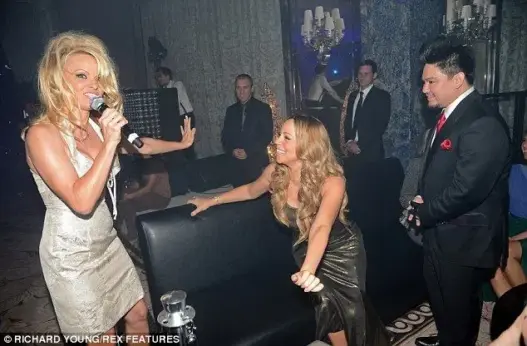 Pamela Anderson and Mariah Carey featured in a retrospective about Anderson's hidden vocals on Loverboy
