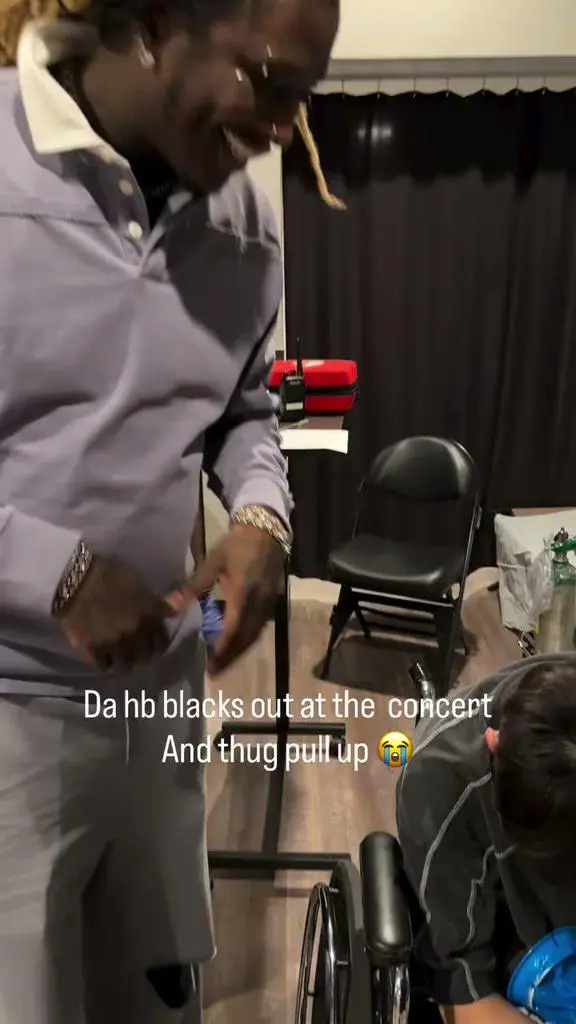 Young Thug approaching a concertgoer in a wheelchair backstage in Phoenix