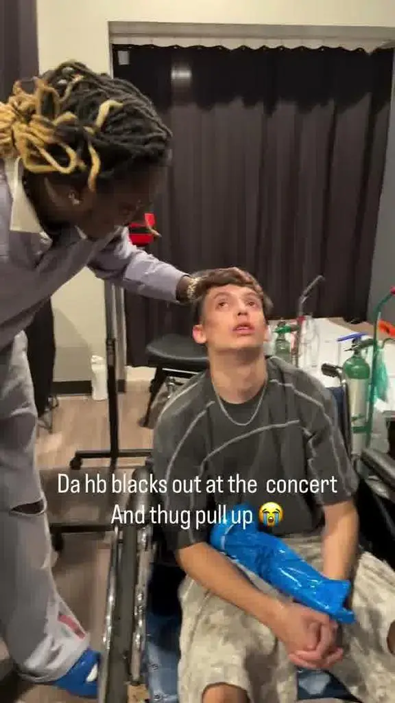 Young Thug with the concertgoer in the wheelchair backstage