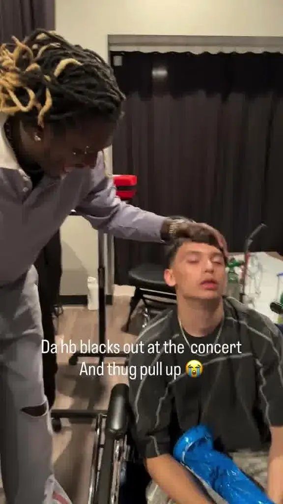 Young Thug laughing during the backstage wheelchair moment