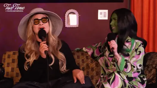 Raven-Symoné and Miranda Maday wearing Halloween costumes during their Tea Time podcast special with Kyle Massey