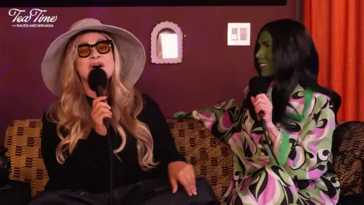 Raven-Symoné and Miranda Maday wearing Halloween costumes during their Tea Time podcast special with Kyle Massey