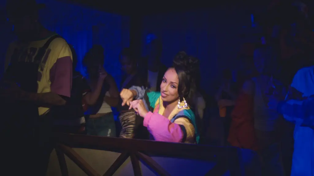 Mýa in a scene from her Saturday Night music video