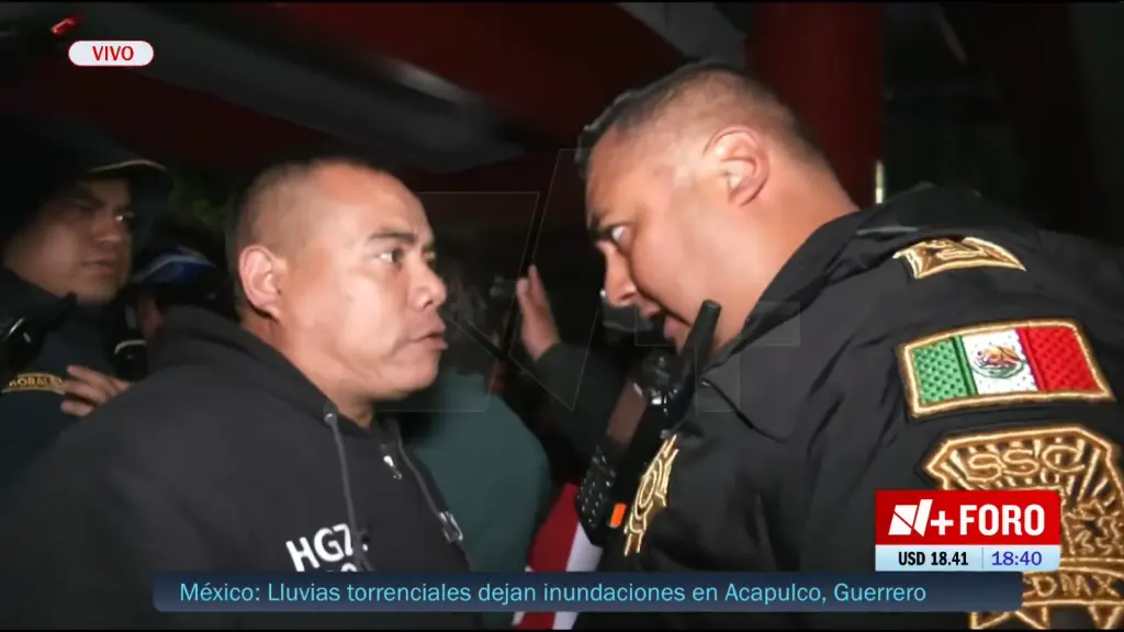 Irlanda Maya amid IMSS protesters and police during the Mexico City confrontation