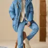 Male model wearing a brown Parajumpers puffer jacket with cream trousers from the Fall/Winter 2026 collection.