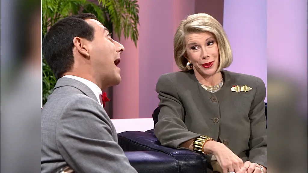 Pee-wee Herman and Joan Rivers talking during their 1989 television interview