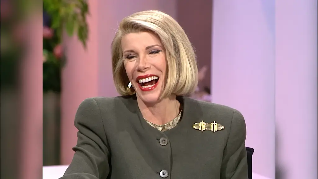 Joan Rivers laughing during Pee-wee Herman’s appearance on her daytime talk show