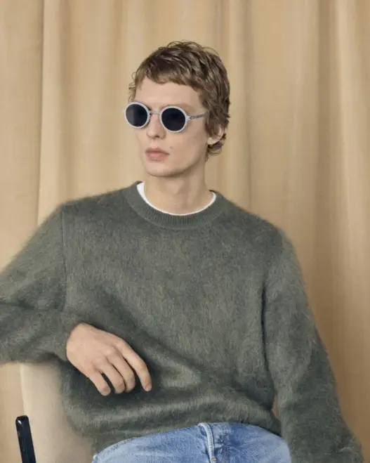 Leon Dame modeling RIMOWA x MYKITA HERITAGE MR007 round sunglasses in The Rehearsal eyewear campaign