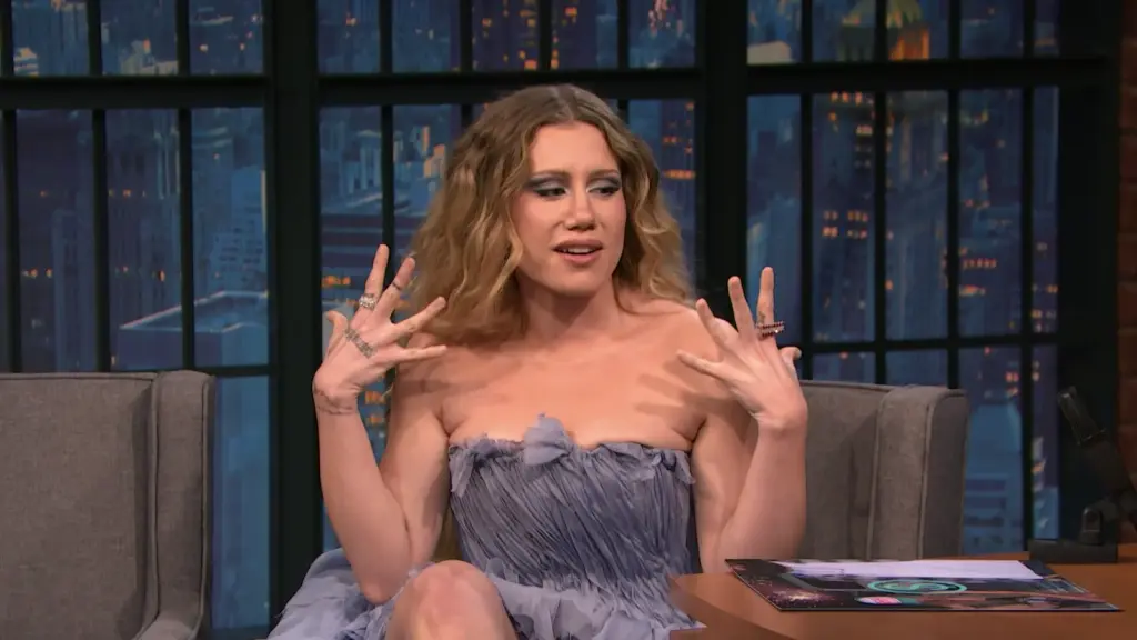 Slayyyter speaking with Seth Meyers on Late Night