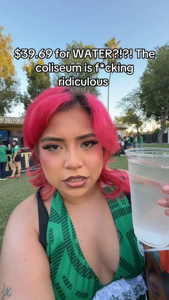 Los Angeles Memorial Coliseum attendee discussing a $39.69 water purchase in a TikTok video