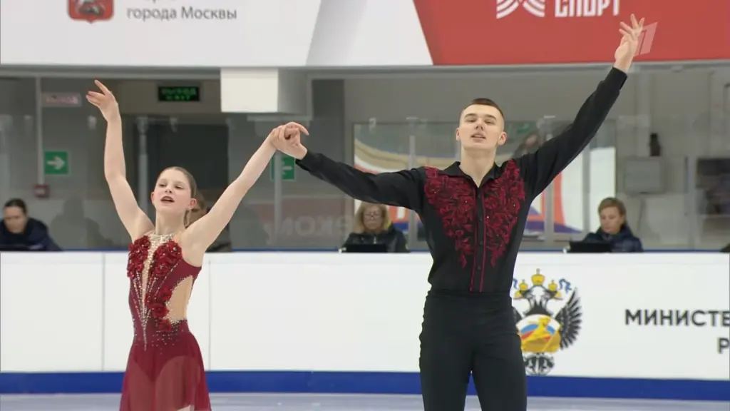 Alexander Samorukov and Darya Tretyakova finishing a pairs skating element