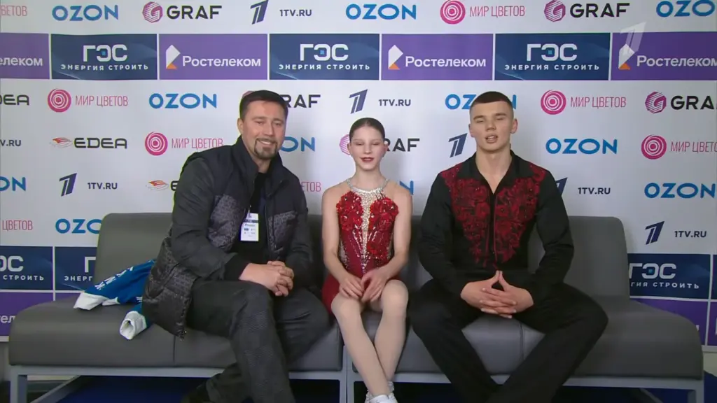 Alexander Samorukov seated with Darya Tretyakova after their performance