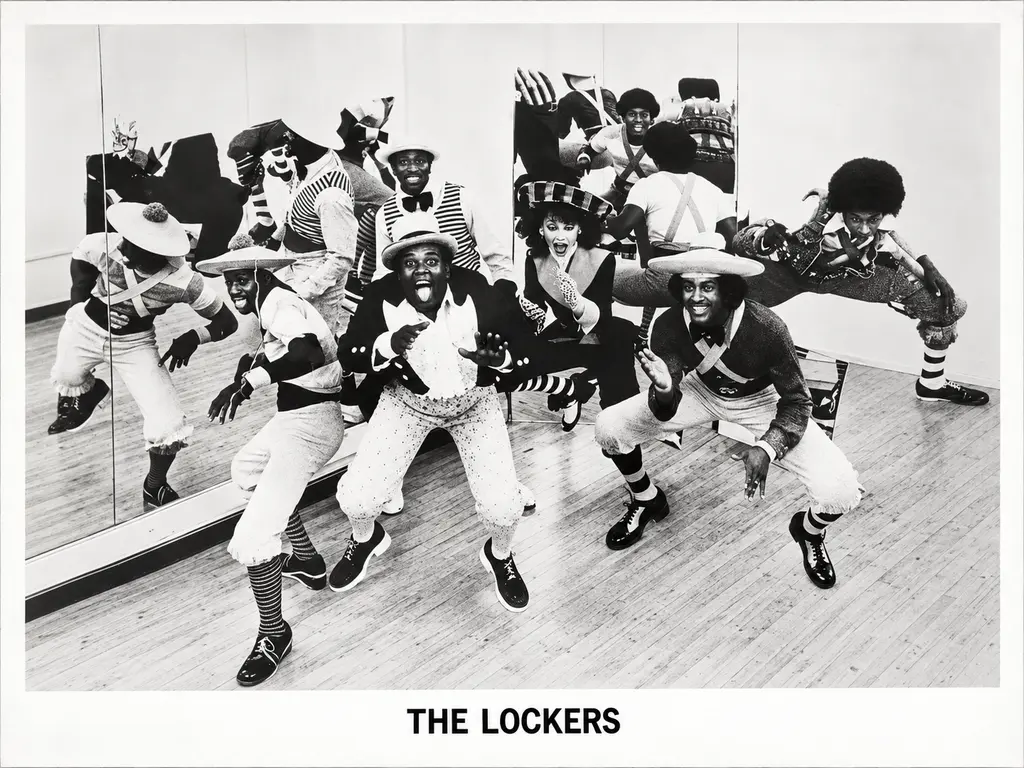 Rare photo of The Lockers featuring Toni Basil, Shabba-Doo, Don Campbell, Fred Mr. Penguin Berry, Greg Campbellock Jr. Pope, Slim the Robot and Fluky Luke