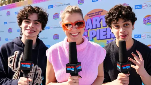 Jodie Sweetin centered with Isaac Ordonez and Raphael Alejandro at UCLA Mattel Children’s Hospital’s Party on the Pier 2026 in Santa Monica.