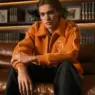 Warren Axelman in an orange Kith Ivy varsity jacket for Fall 2026
