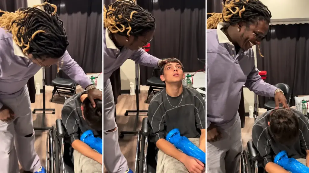 Young Thug with a concertgoer in a wheelchair backstage in Phoenix